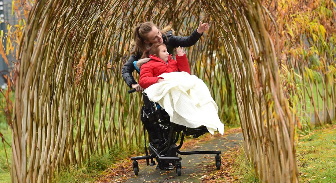 willow arch with staff and student